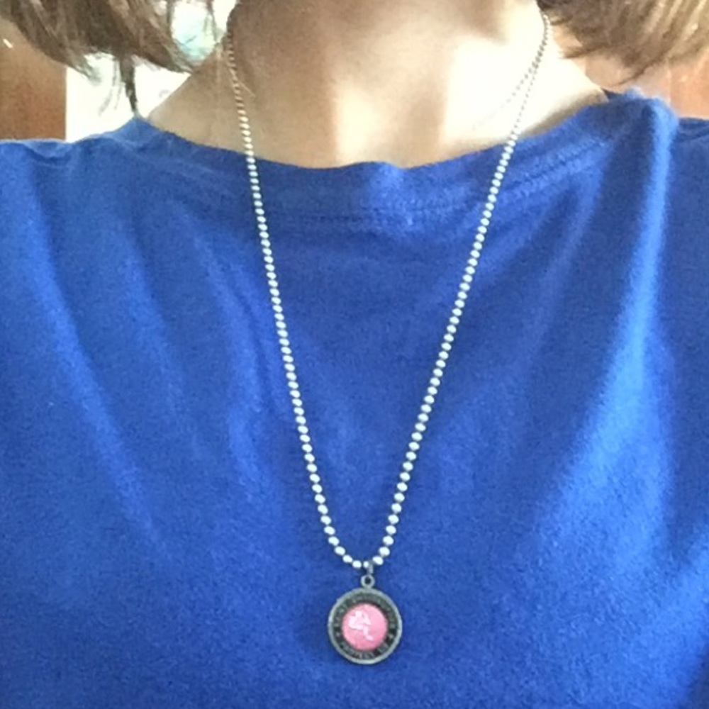 pink st christopher’s necklace